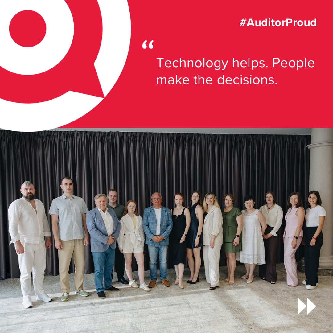 BDO in Ukraine audit team gathered for Auditor Proud Day 2026 beneath a presentation screen displaying the message “Technology helps. People make the decisions.”, highlighting professional expertise, collaboration, and the human side of auditing