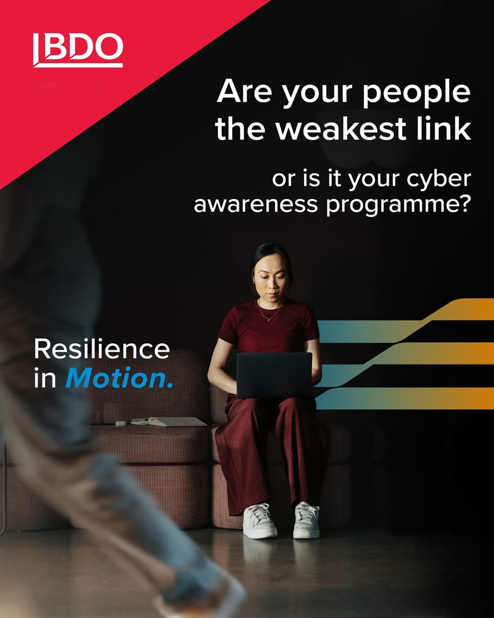 BDO Resilience in Motion: a professional working on a laptop. Cybersecurity awareness training and the human factor in protecting organisations from cyber threats.