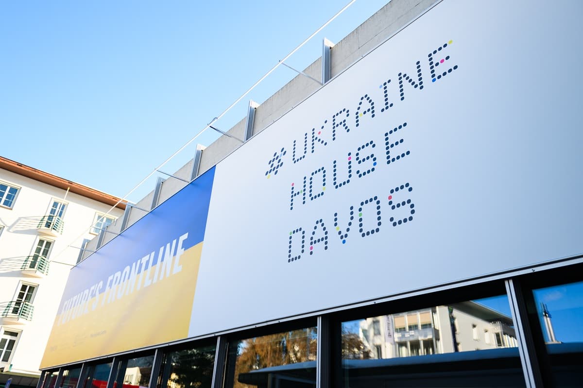 Ukraine House Davos at WEF26 - Ukraine's platform in Davos The facade of the Ukraine House Davos pavilion with a large inscription «Ukraine House Davos» and a banner in blue and yellow colours during the World Economic Forum in Davos, Switzerland.